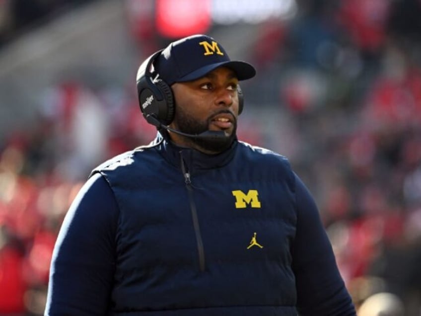 COLUMBUS, OHIO - NOVEMBER 30: Head coach Sherrone Moore of the Michigan Wolverines stands
