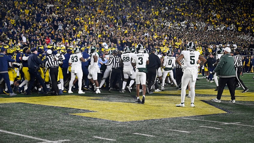 Michigan-Michigan State players fight