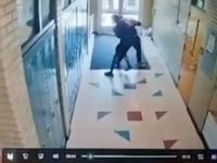 Michigan middle school coach caught on video allegedly choking 14-year-old student in hallway
