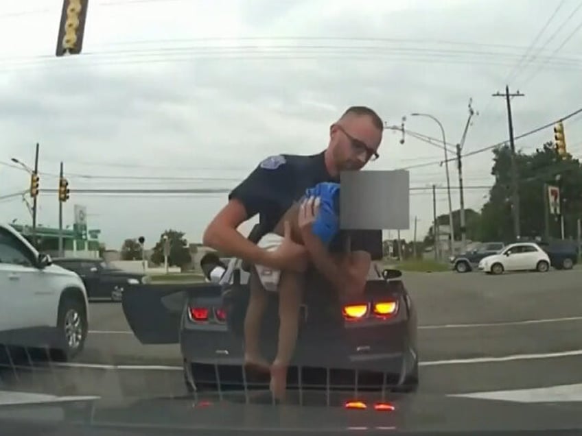 michigan police officer saves babys life during traffic stop