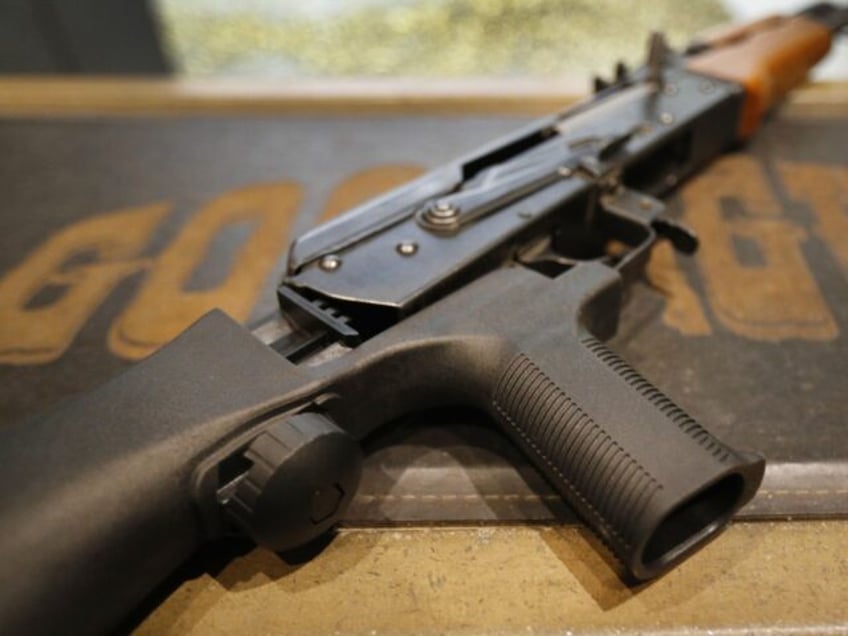 OREM, UT - FEBRUARY 21: A bump stock is installed on an AK-47 at Good Guys Gun and Range o