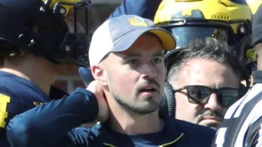 michigan staffer at center of sign stealing scandal believed to be mystery man on central michigan sideline