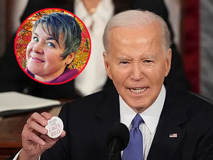 President Joe Biden holds up a Laken Riley button as he delivers the State of the Union ad