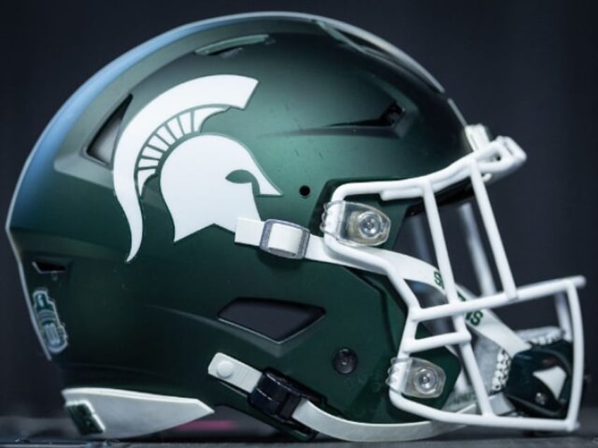 michigan state scoreboard shows pic of hitler before michigan game