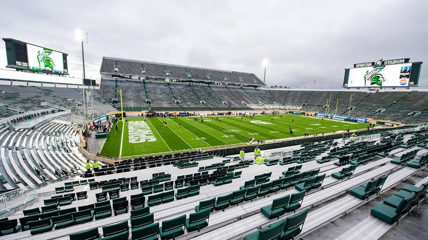 michigan state suspends employee after image of hitler is displayed on video board before kickoff