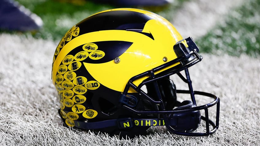 michigan suspended football analyst amid ncaa investigation over alleged sign stealing