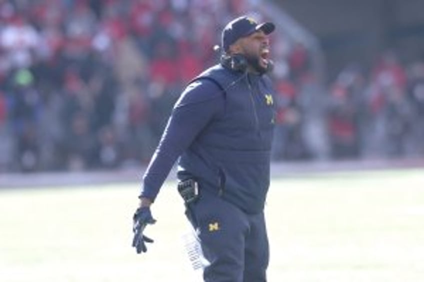 Michigan to suspend football coach Sherrone Moore for role in advanced scouting scandal
