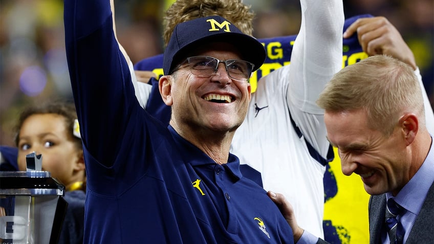 michigan working on lucrative contract extension for jim harbaugh with interesting caveat report