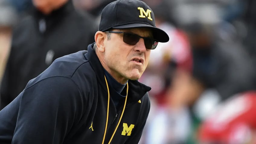 michigans jim harbaugh facing 4 game suspension report