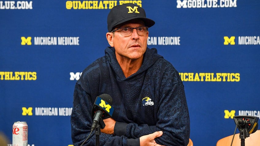 michigans jim harbaugh facing 4 game suspension report