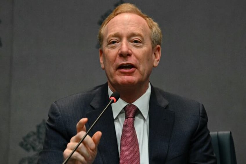 Microsoft president Brad Smith says the United States is in a race with China to spread it