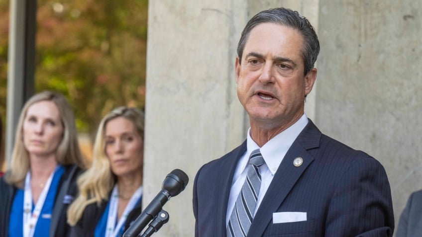 Todd Spitzer speaks at a press conference