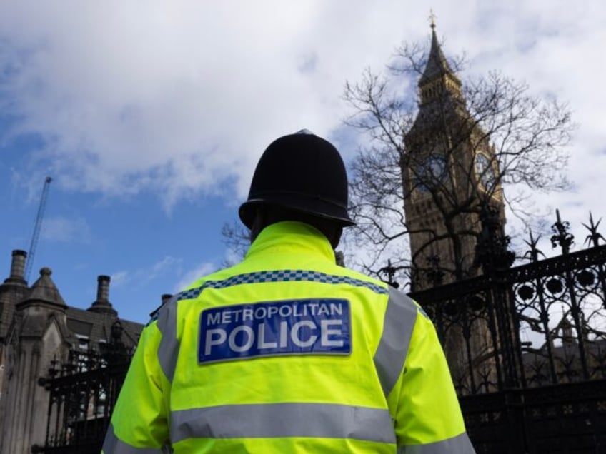 LONDON, ENGLAND - MARCH 21: Metropolitan Police officers outside the Houses of Parliament