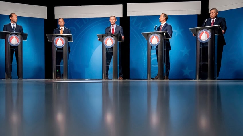 From left, JR Bird, John Dougall, Mike Kennedy, Case Lawrence and Stewart Peay, candidates in the Republican primary for Utah's 3rd Congressional District, take part in a debate at the Eccles Broadcast Center in Salt Lake City on June 12, 2024.