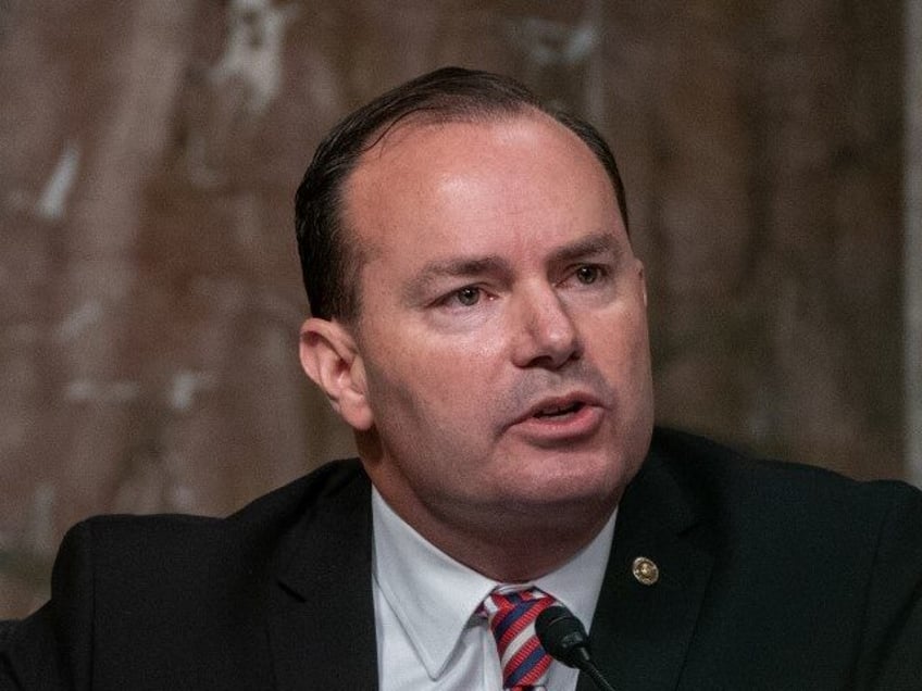 U.S. Sen. Mike Lee (R-UT) asks a question of former FBI Director James Comey at a hearing