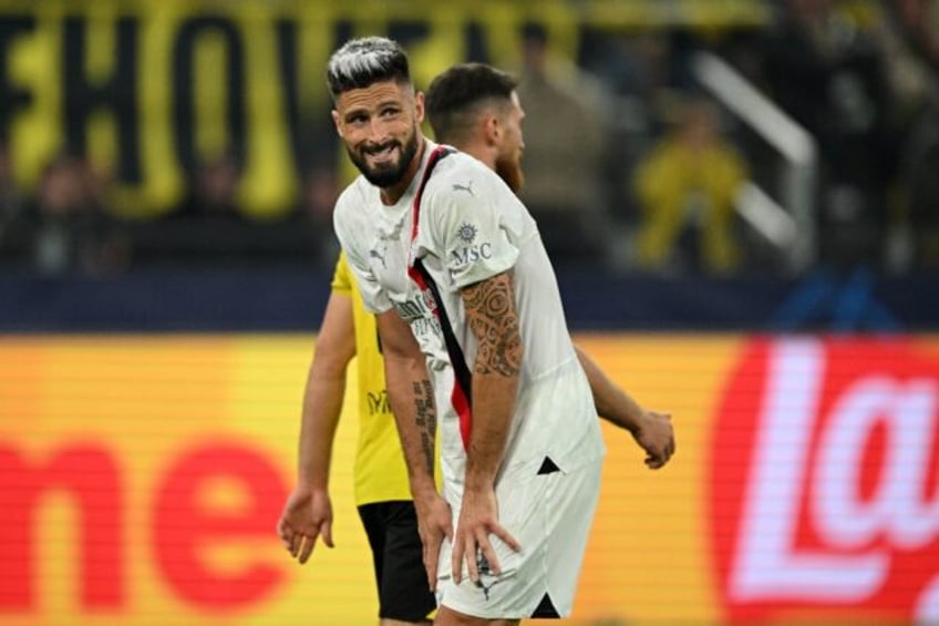 milan play out second straight champions league stalemate in dortmund