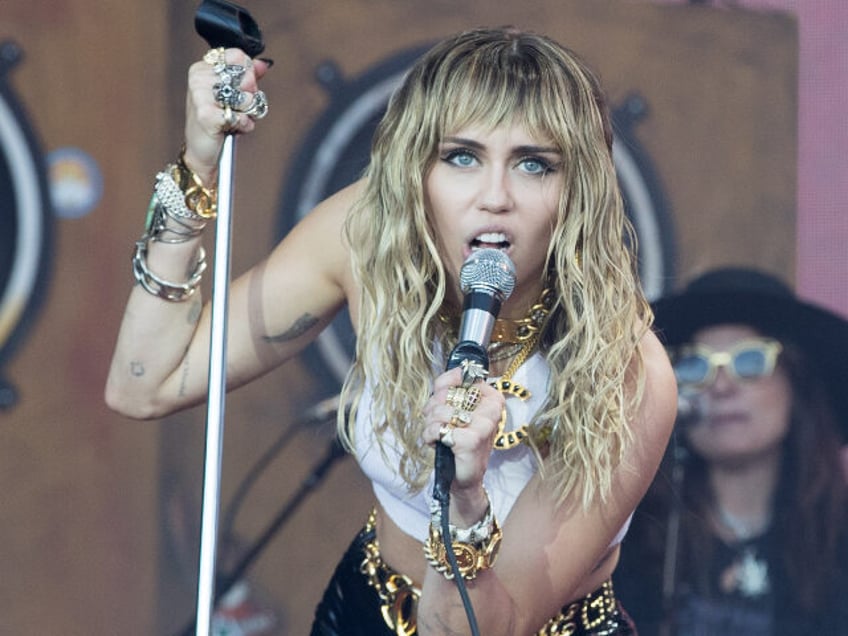 GLASTONBURY, ENGLAND - JUNE 30: Miley Ray Cyrus performs live on the Pyramid stage during