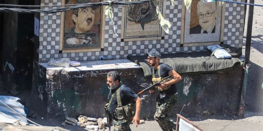 militants still occupying school in lebanons largest palestinian camp as clashes between factions have ended