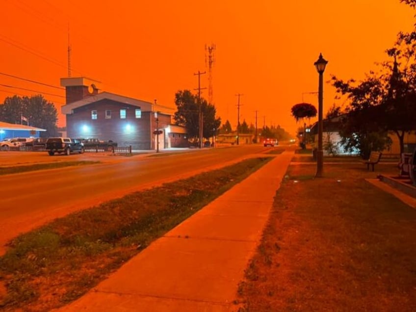 military airlifts provide escape as wildfires sweep canadas far north