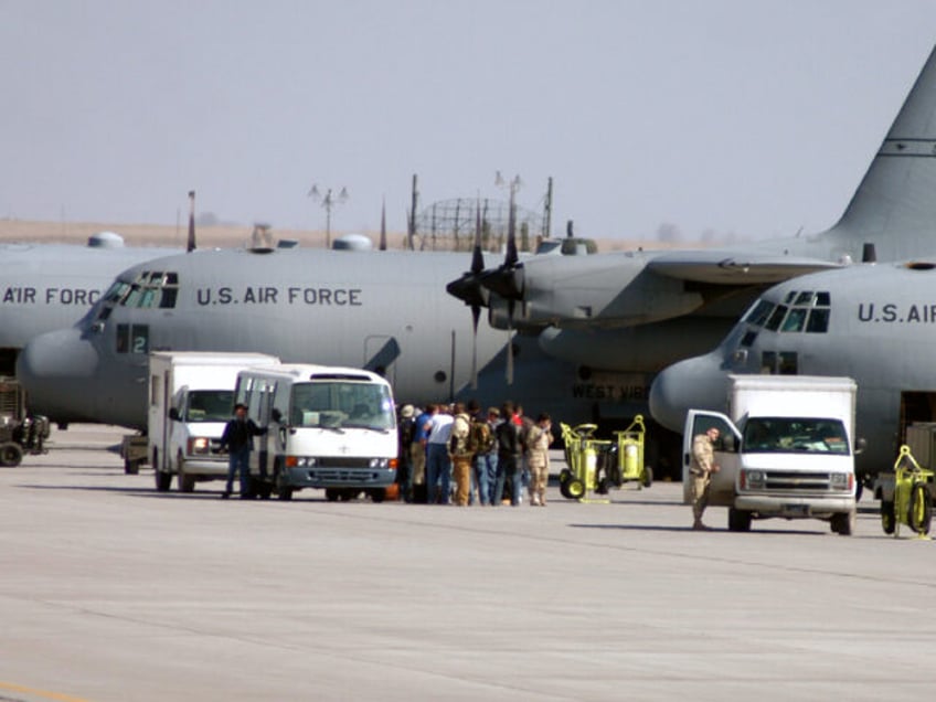 Air Force C-130 Hercules Loading Passengers (FILE: U.S. Air Force)