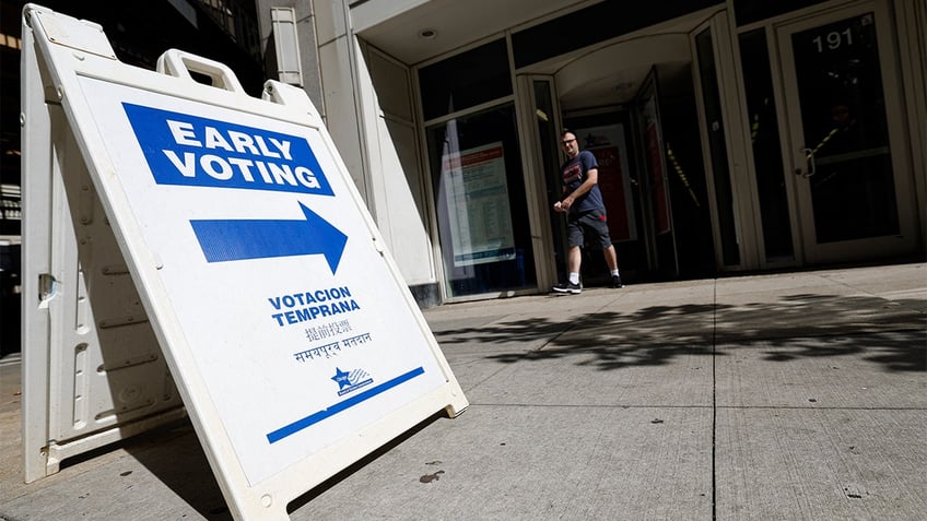 A man walks out of the Board of Elections Loop Super Site after casting his ballot in the 2024 presidential election on the second day of early voting in Chicago, on Oct. 4, 2024.