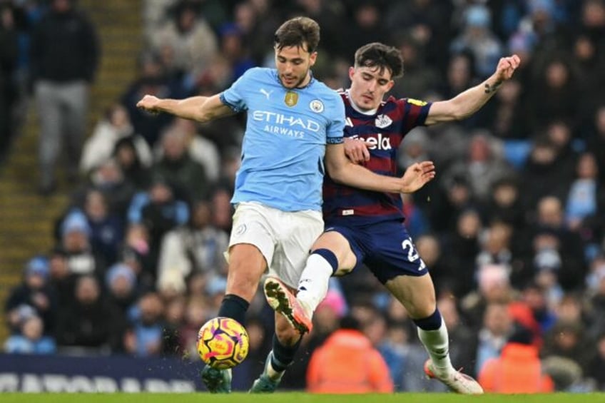 Manchester City's Nico Gonzalez (left) was compared to Rodri by Pep Guardiola