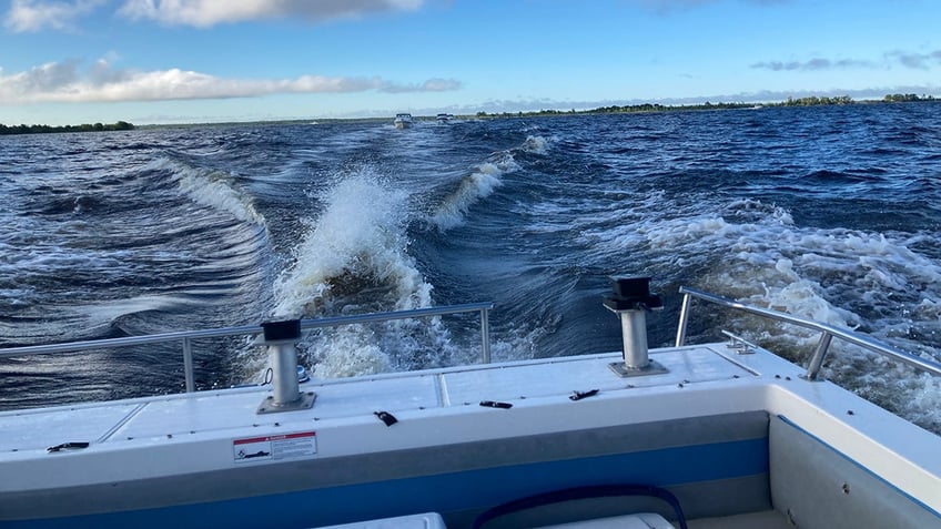 minnesota boy reels in wallet filled with 2000 cash while fishing and returns it to iowa farmer