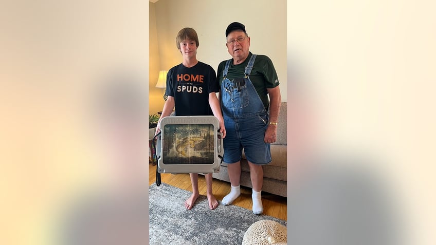 minnesota boy reels in wallet filled with 2000 cash while fishing and returns it to iowa farmer