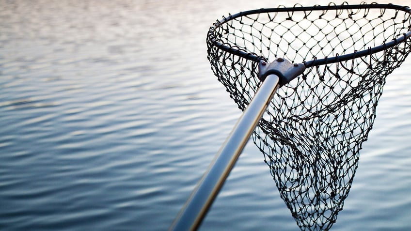 minnesota boy reels in wallet filled with 2000 cash while fishing and returns it to iowa farmer