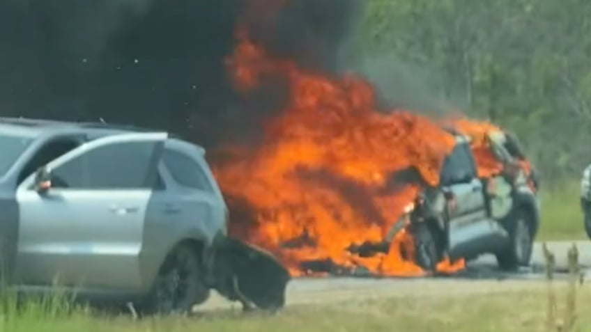 minnesota deputy escapes with minor injuries after vehicle crash leaves police vehicle in flames video