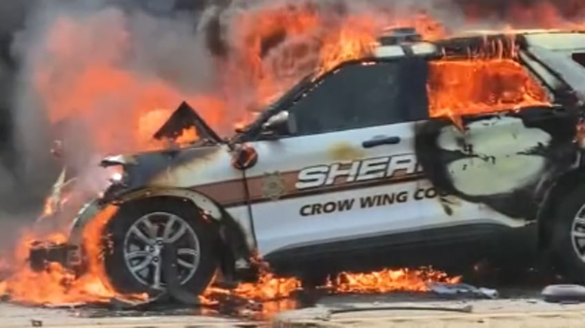 minnesota deputy escapes with minor injuries after vehicle crash leaves police vehicle in flames video