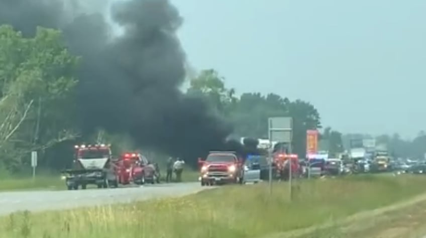 minnesota deputy escapes with minor injuries after vehicle crash leaves police vehicle in flames video