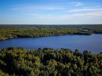 Minnesota man, 62, on solo camping trip found dead in lake near overturned canoe