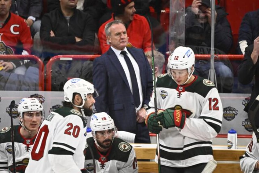 minnesota wild fire coach dean evason assistant bob woods after losing 14 of their first 19 games