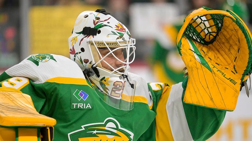 minnesota wild goalie wears native american mask despite threats of punishment from nhl