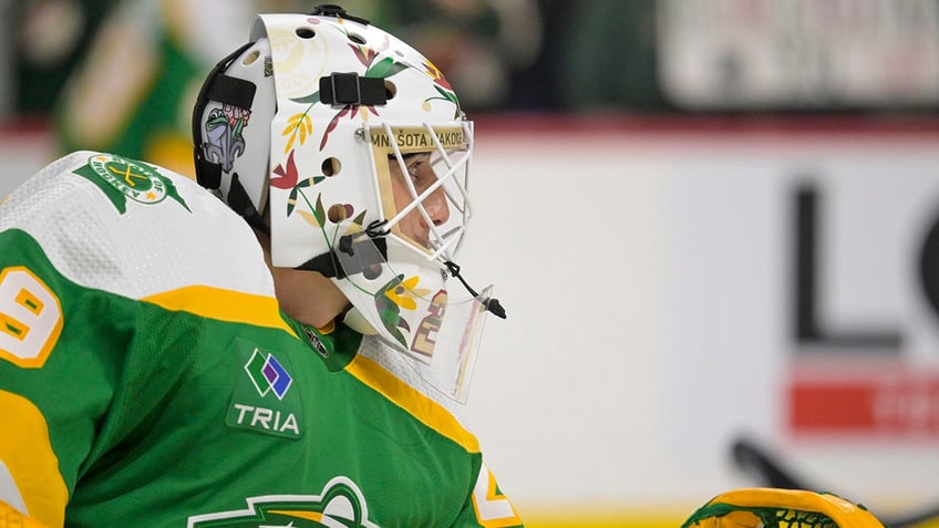 minnesota wild goalie wears native american mask despite threats of punishment from nhl