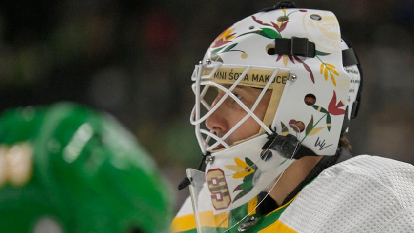 minnesota wild goalie wears native american mask despite threats of punishment from nhl