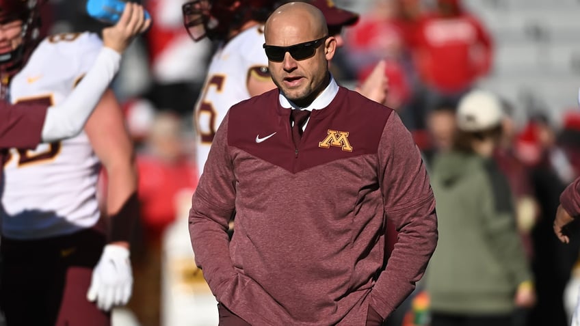 PJ Fleck watches team warm up