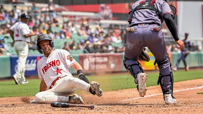 A Fresno player slides