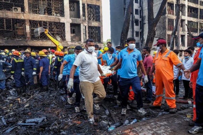The death toll from a plane crash in India has reached 260, including people on the ground
