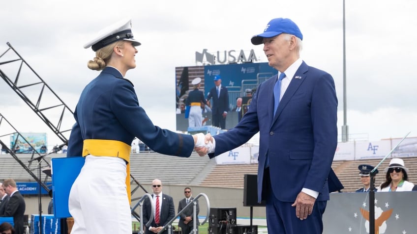 Madison Marsh shaking Joe Bidens hand