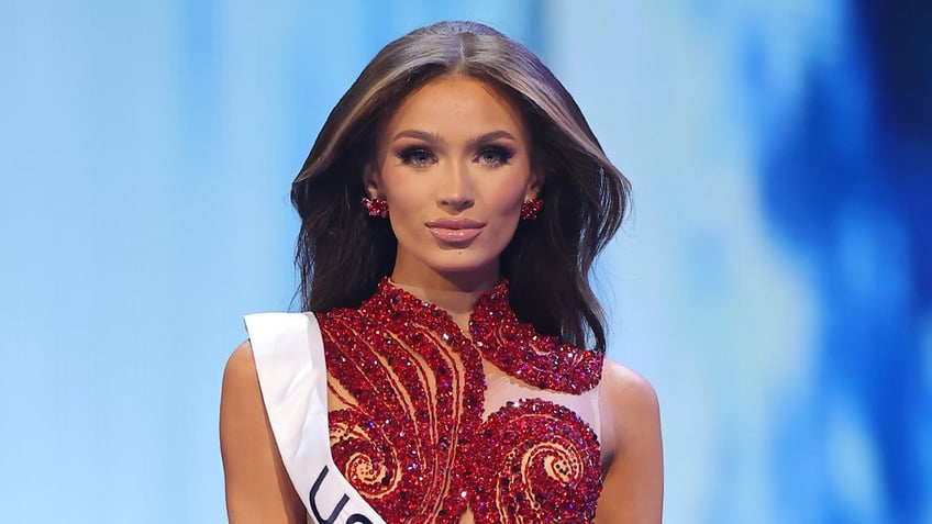 Noelia Voigt wears sparkling red dress at Miss USA pageant