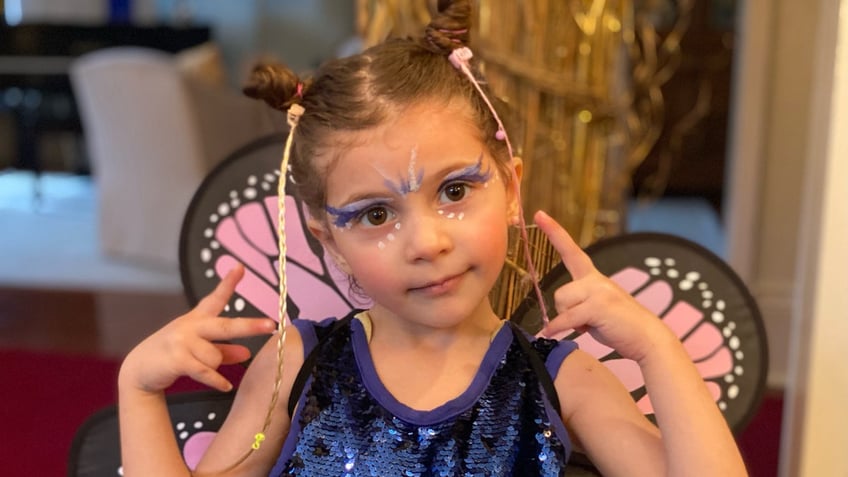 missing halloween for heart surgery neighbors throw early trick or treat surprise for 4 year old girl