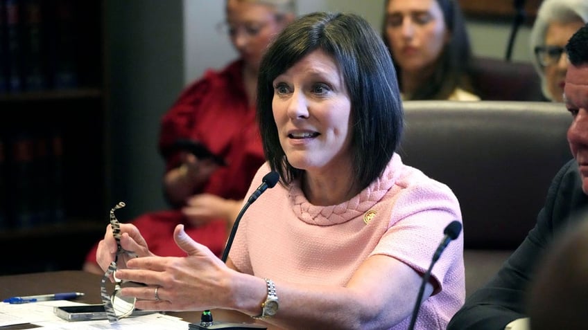 Mississippi House Medicaid Committee Chairman Rep. Missy McGee discusses the cost of Medicaid expansion at a public legislative conference committee meeting held at the State Capitol