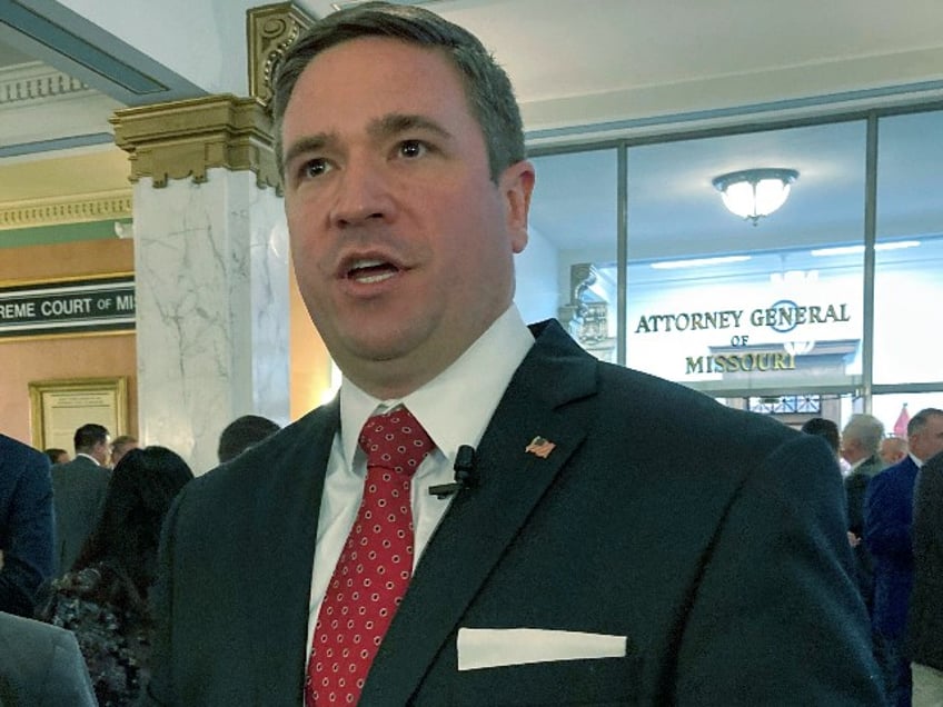 Missouri Attorney General Andrew Bailey speaks to reporters after taking the oath of office in Jefferson City, Mo., on Tuesday, Jan. 3, 2023. Bailey was appointed attorney general by Gov. Mike Parson after the former officeholder, Eric Schmitt, won election to the U.S. Senate. (AP Photo/David A. Lieb)