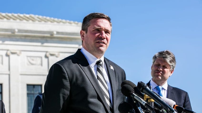 Andrew Bailey speaking at an event