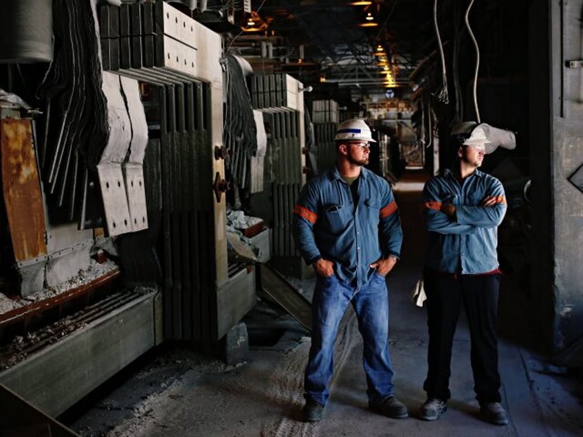 HAWESVILLE, KY - May 10 (L-R) Supervisor Billy Hughes and technician Ryan Young stand for a portrait along an aluminum potline at Century Aluminum Company's Hawesville plant in Hawesville, Ky. on Wednesday, May 10, 2017. (Photo by Luke Sharrett /For The Washington Post via Getty Images) Aluminum