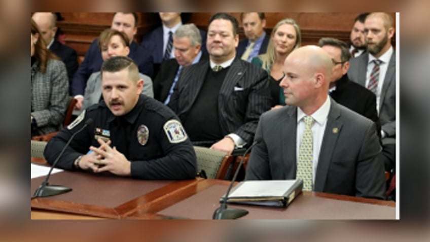 St. Joseph Police Officer Lucas Winder (L) and Sen. Tony Luetkemeyer (R)