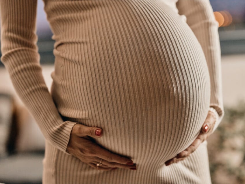 Close-up of a pregnant belly.