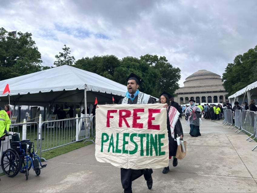 Pro-Palestian graduates leave an outdoor commencement at Massachusetts Institute of Techno